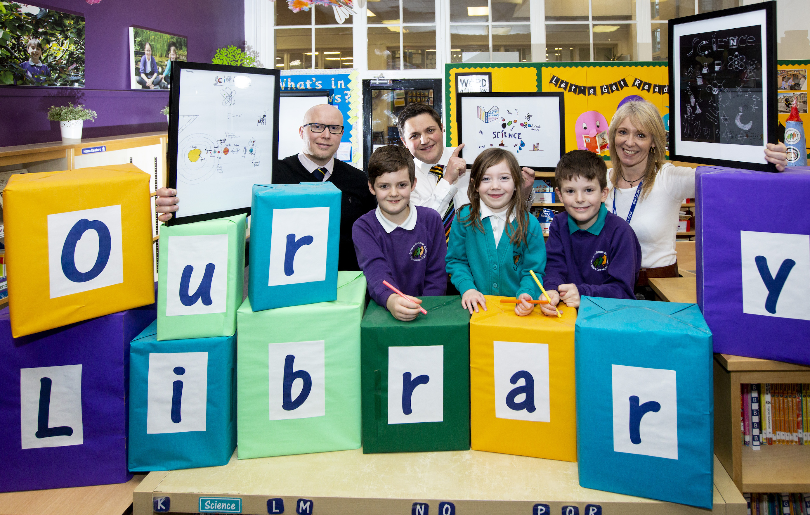 Airedale Chemical - (-r) Airedale Chemical's Daniel Marr, Simeon (Year 6), David Horton (teacher at Sutton in Craven Community Primary School), Poppy (Year 1), Harry (Year 4) and librarian Mrs Broughton[3][1]