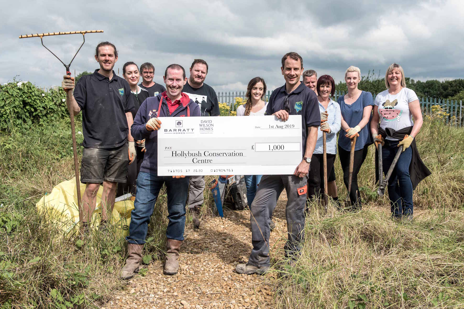 Finance Director, Andy Donoghue and his team with Hollybush Conservation Centre