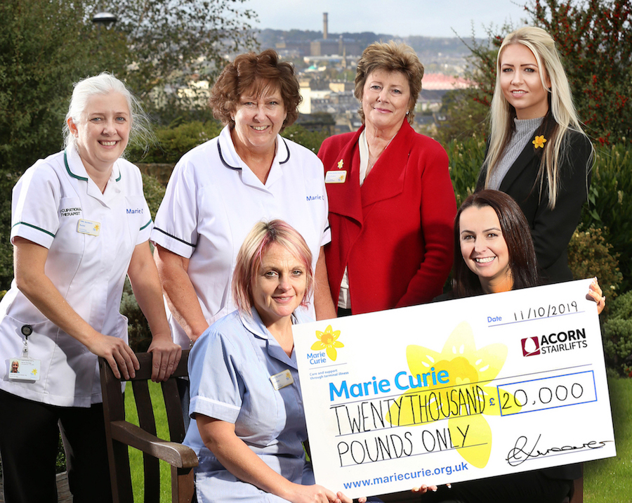(Landscape) Acorn Stairlifts celebrate after raising £20,000 for Marie Curie copy 2
