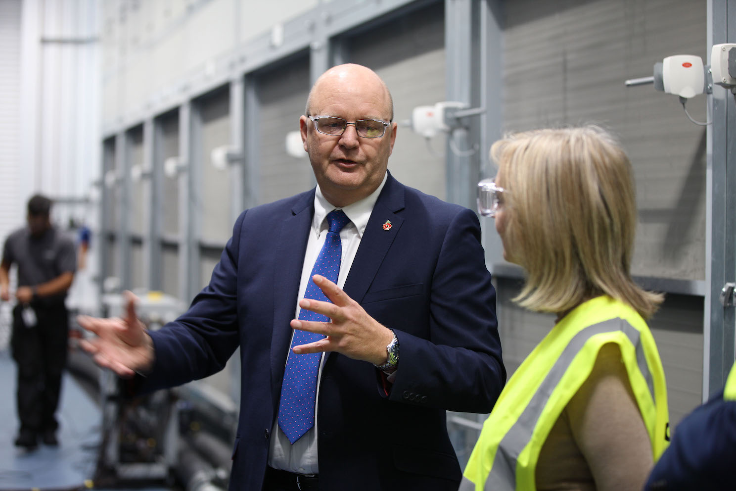 Md of Airedale International, Tony Cole speaking to Liz Truss on her visit to the site