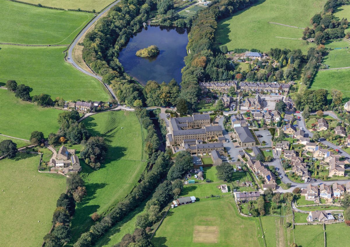 An aerial view showing Newby's Glasshouses Mill development