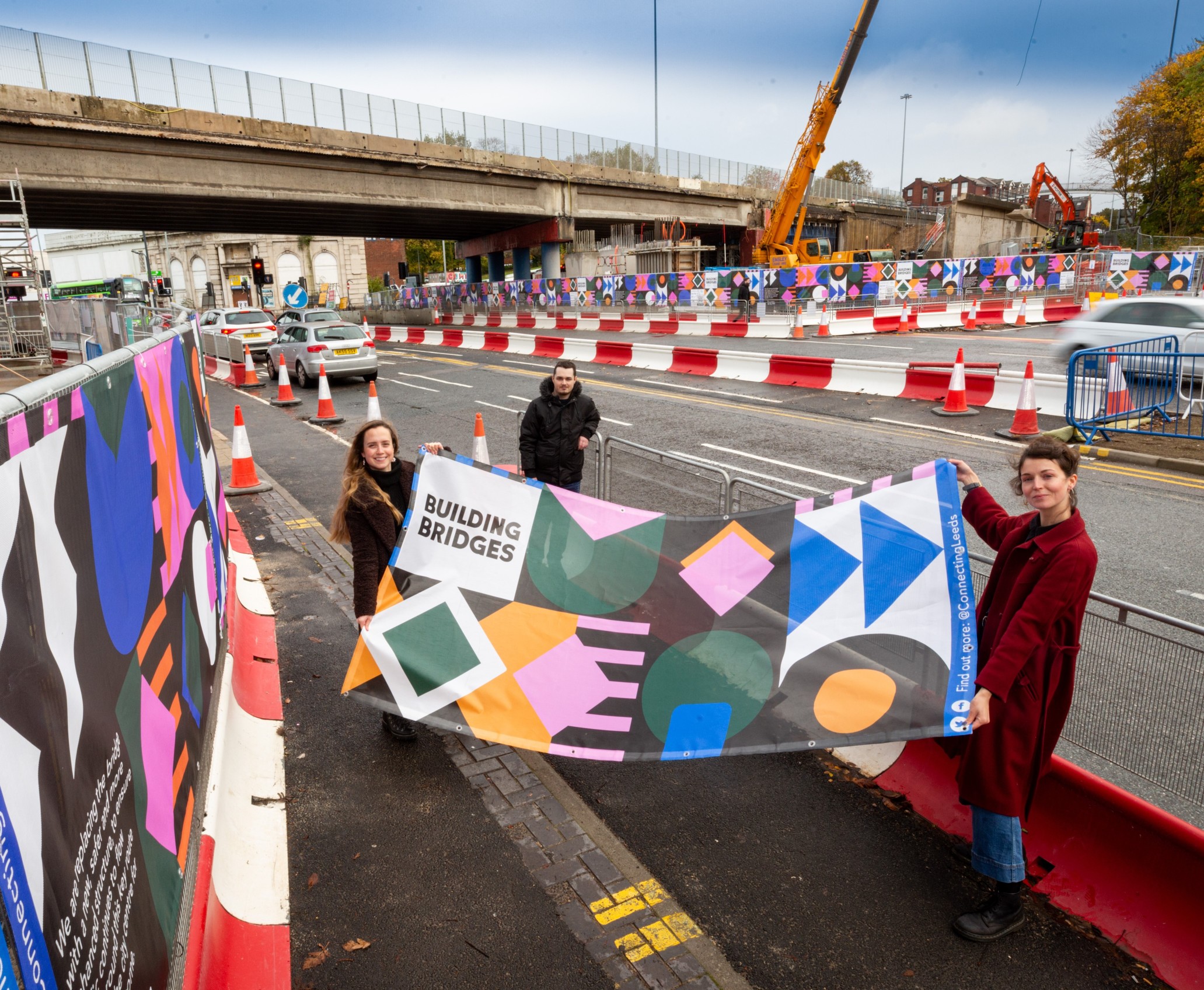 (L-R) Emily Harrison from Balfour Beatty, University Centre Leeds Graphics student James Denbigh and artist Emily Hardaker.-de8a4bce