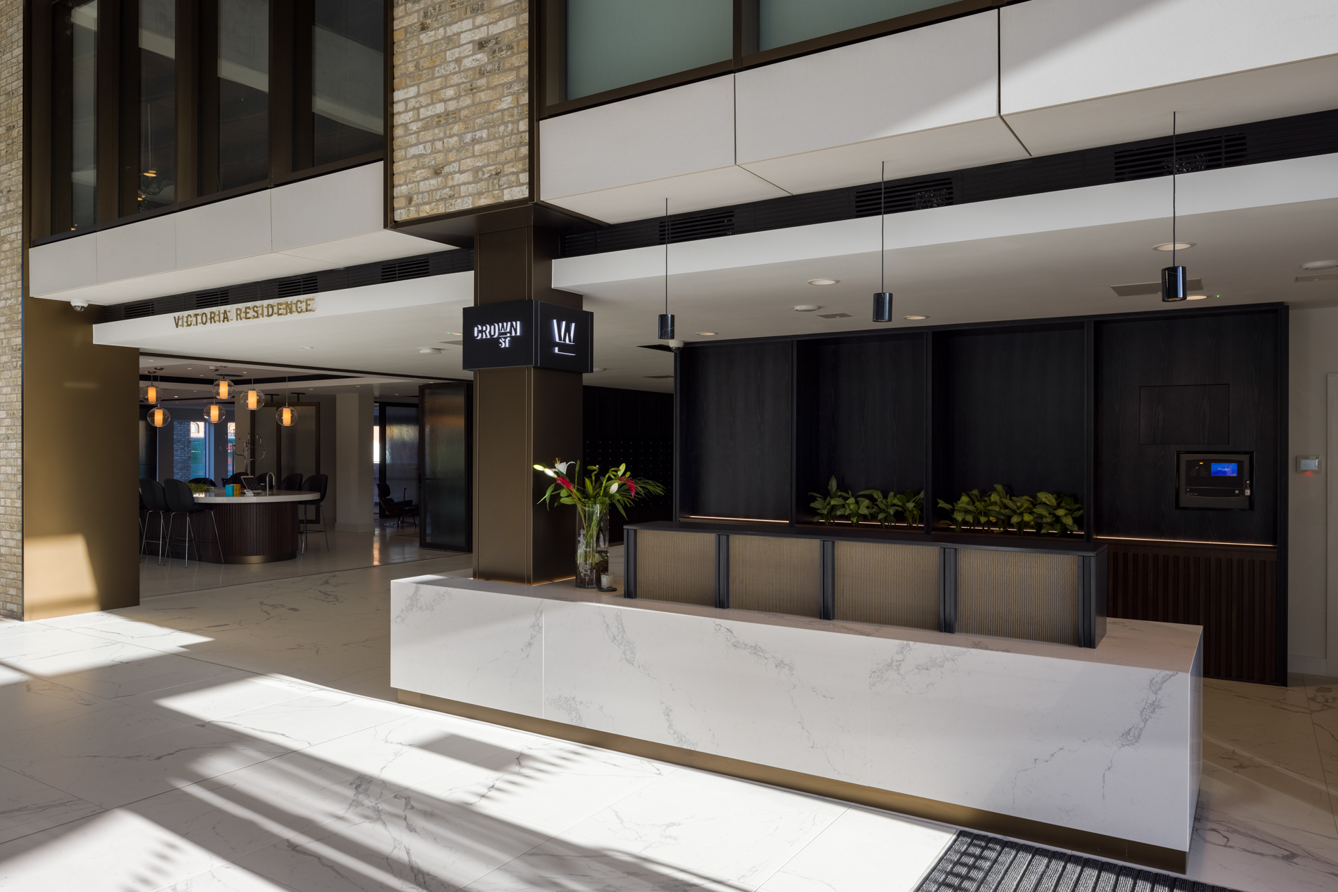 The atrium to one of the buildings featuring signage by Widd Signs-4483c43e
