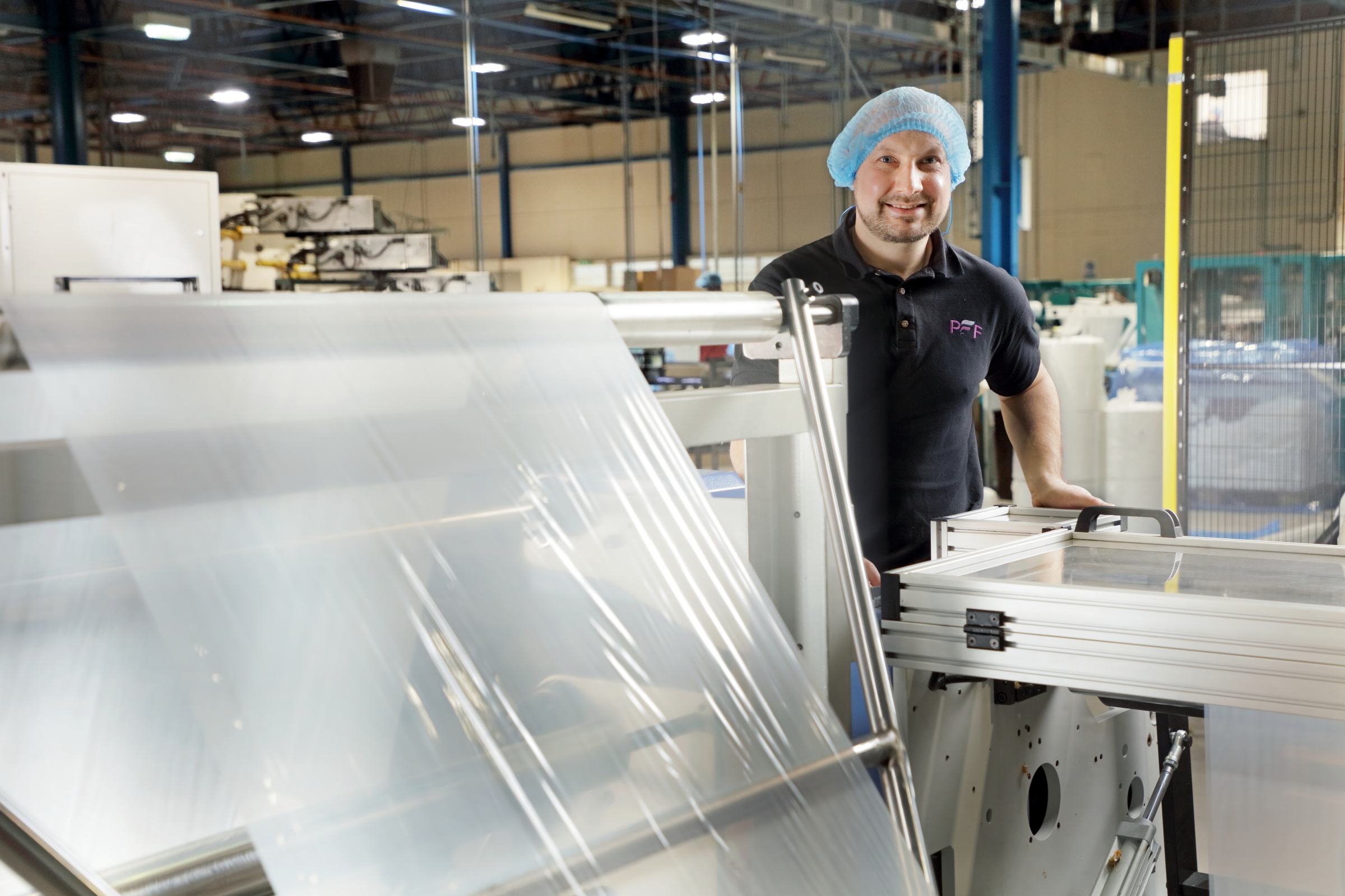 Lee Wilkinson of PFF Group with the new folding machines-d90ddb54