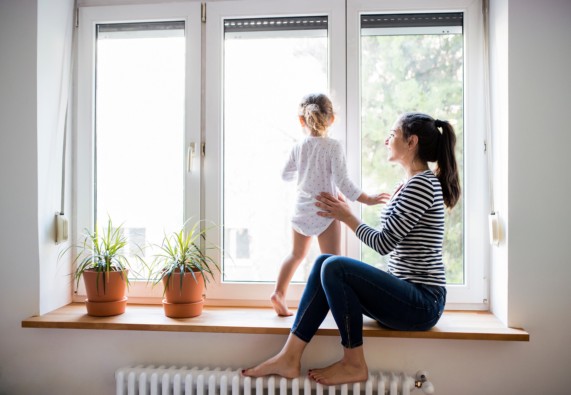 alpha-boilers-woman-and-baby-at-window- SMALL-900e37ac