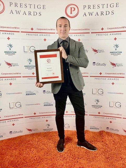 Iain Patton, MD Receiving the Award