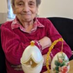 Deangate Care Home resident Margaret Smith, 88, with her Fabergé‑style decorated eggs.